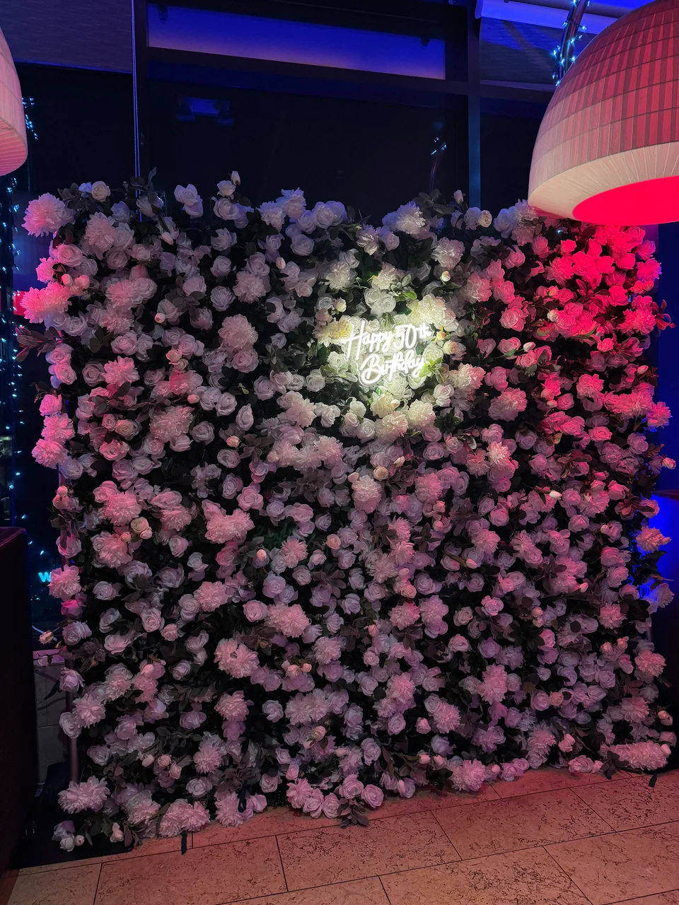 BloomHaus floral backdrop at a wedding reception