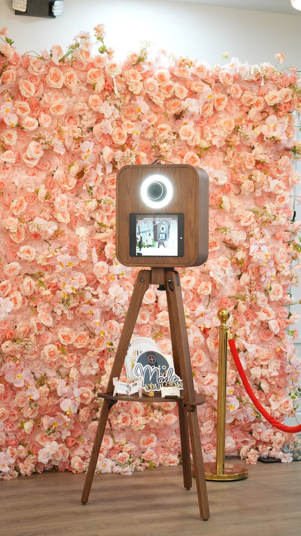 Lush floral wall backdrop styled for a celebration